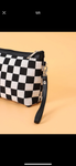 Zippered clutch checkerboard bag with leather patch