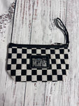 Zippered clutch checkerboard bag with leather patch