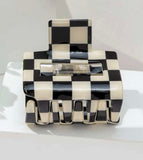 Checkerboard claw clip